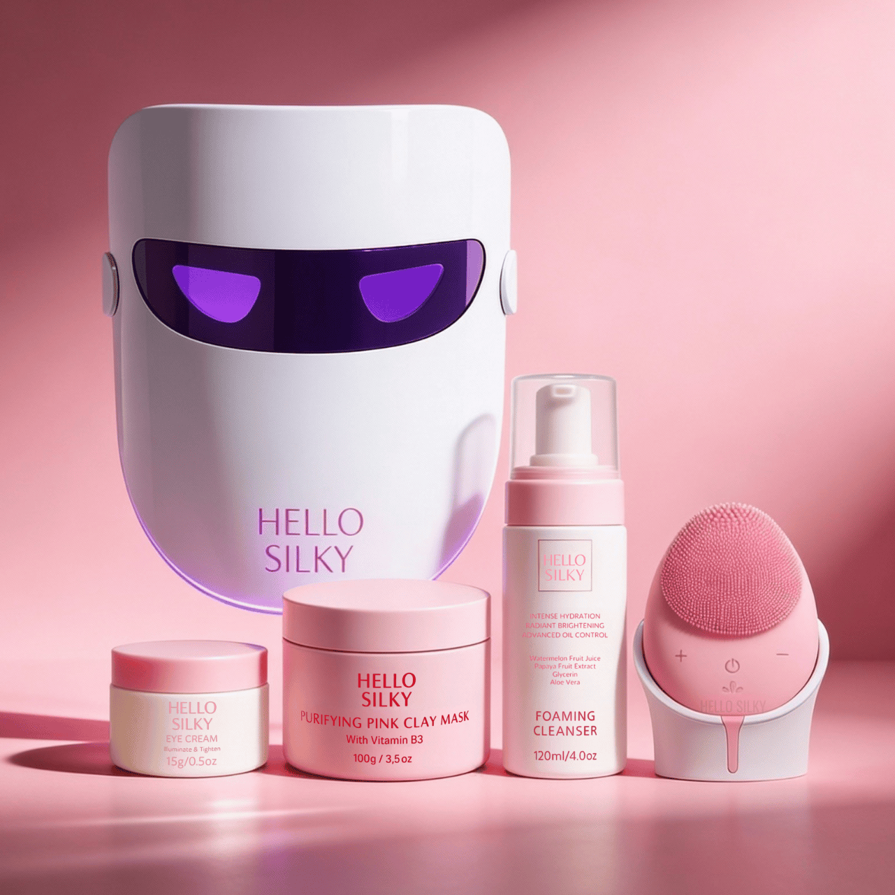 Cosmetic set with LED face mask, cream jars, and bottles on a pink background