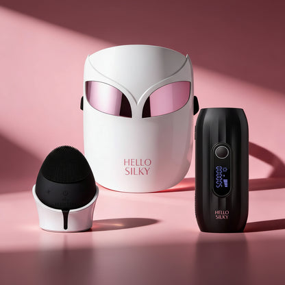 Hello Silky skincare device set on a pink background